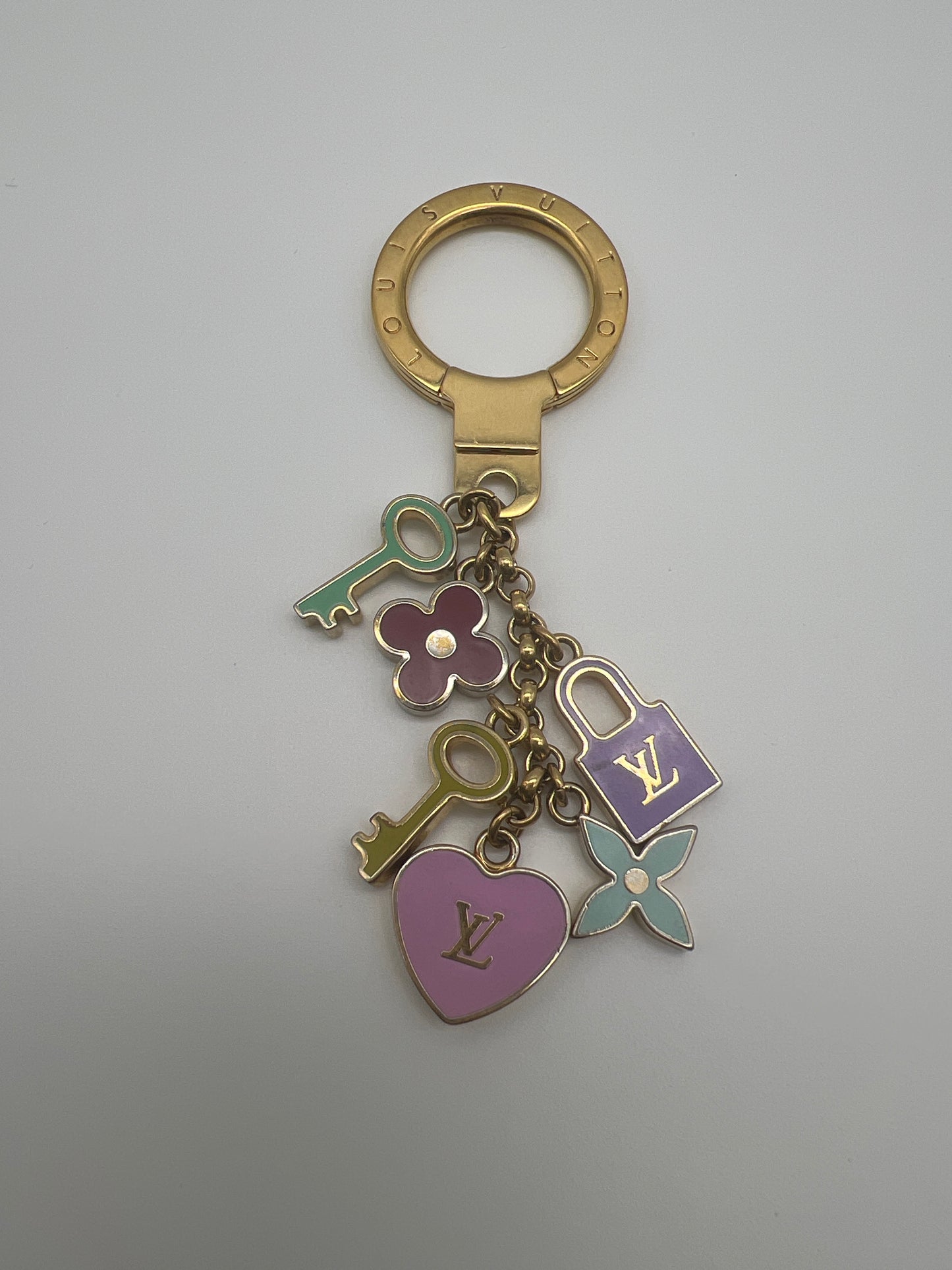 LOUIS VUITTON LOCK KEY AND FLOWER CHARM